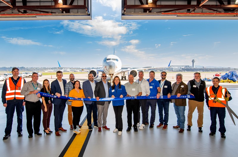 Employees from Tech Ops, Airport Ops, Corporate Real Estate, and airport officials took part in the ceremonial ribbon-cutting